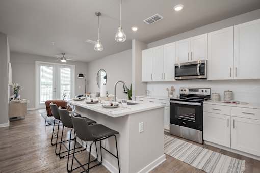 Kitchen with Long Island at The Residences at Enso, Jacksonville, FL, 32224