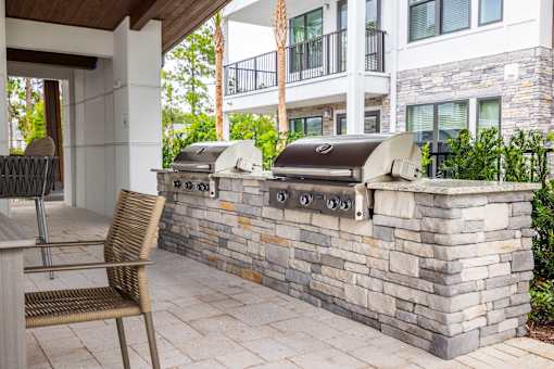Summer Kitchen with seating at The Residences at Enso, Florida