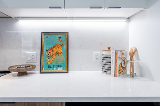 A picture of a tiger is on a white countertop.