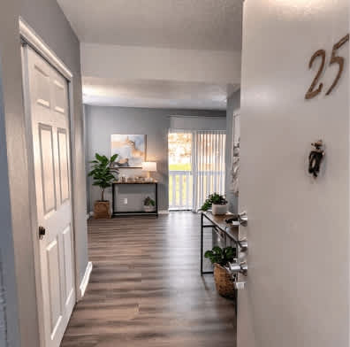 A hallway with a number 25 on the wall.