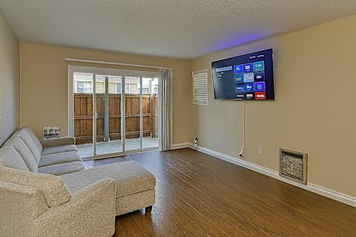 Image of living room with balcony located at Ramona Oaks in Riverside, CA
