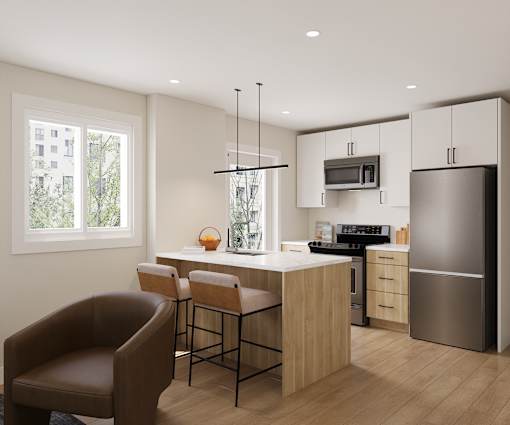 A modern kitchen with a brown leather chair and wooden bar stools.