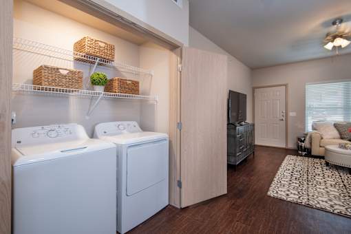 A laundry room with a washer and dryer.