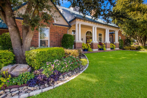 Townhomes of Bent Tree Entrance with Flowers