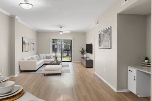 Open living room with breakfast bar and built-in desk