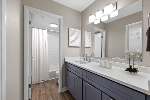 Bathroom with a shower and toilet and sink