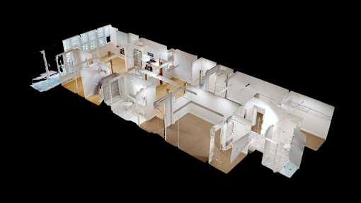 A 3D model of a house with various rooms and furniture.