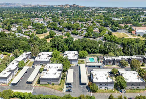 Bird's eye view of a suburban area with a large building at Vacaville Park Apartments, Vacaville, CA, California 