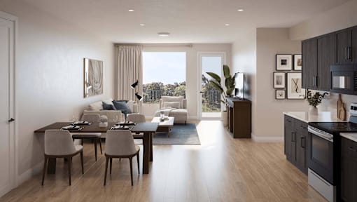 A modern kitchen and dining area with a view of the outdoors.