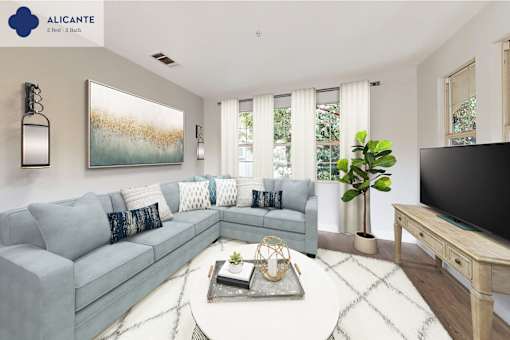 A living room with a grey couch, a coffee table, and a painting on the wall at Mission Hills, Camarillo, 93012