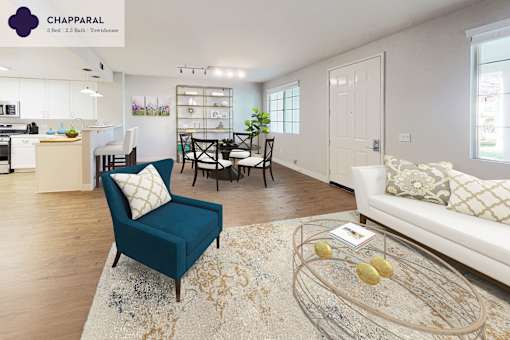 A living room with a blue chair and a coffee table at Mission Hills, Camarillo, 93012