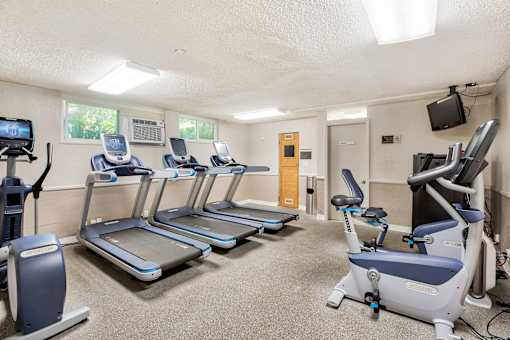 the gym has plenty of cardio equipment and treadmills at Casa Granada, Los Angeles, 90049