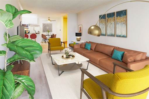 a living room with a brown couch and yellow chairs at Casa Granada, Los Angeles, CA