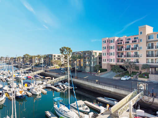 a view of a marina with boats and buildings  at Marina Harbor, Marina del Rey