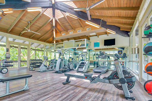a gym with treadmills and other exercise equipment at the resort  at Rancho Los Feliz, Los Angeles, California