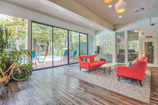 a living room with a couch and chairs and a patio  at Rancho Los Feliz, Los Angeles, CA, 90039