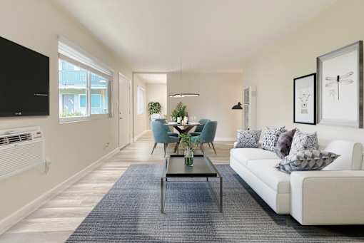A living room with a white couch and a coffee table at Pleasanton Heights, California