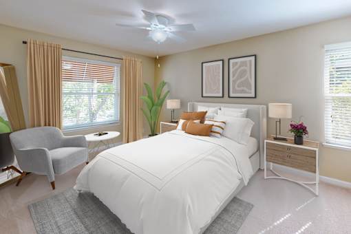 A bedroom with a large bed, a chair, and a ceiling fan at Valley Plaza Villages, California, 94566