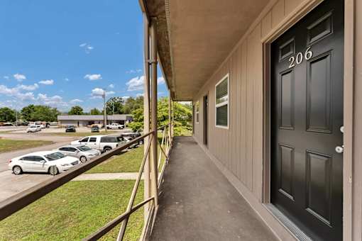 A black door with the number 206 on it.