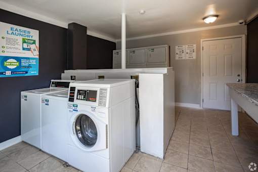 A laundry room with a washer and dryer.