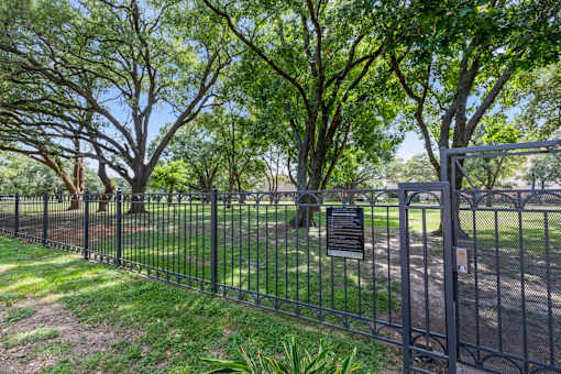 Dog park entrance at Asheville at Spring Branch apartments in Houston, TX
