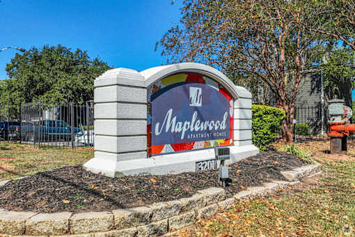 Maplewood Apartment Homes sign at Maplewood apartments in Shreveport, LA.