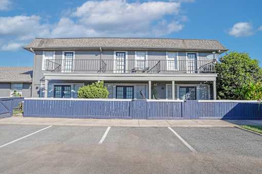 Parking right by the apartments which have patios and balconies at The Oasis apartments in Bossier City, LA