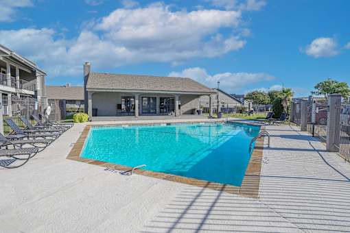 Large outdoor swimming pool at The Oasis apartments in Bossier City, LA