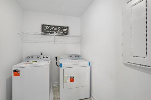 A laundry room with a sign that says Fluffy Food.