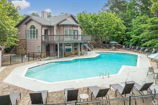 A house with a pool in the backyard.
