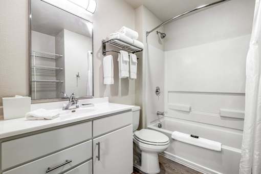 a bathroom with a sink toilet and a shower at Parks Residential - Denver, Centennial, CO 80111