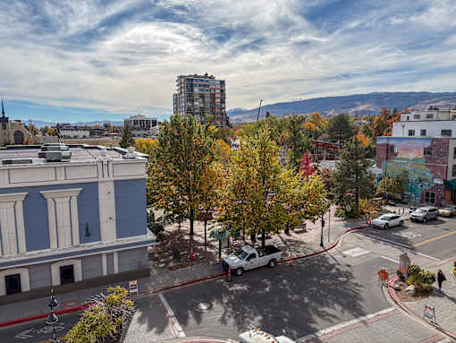A street view of a city with cars and buildings at ONE18 West Street Residential Apartments, Nevada, 89501