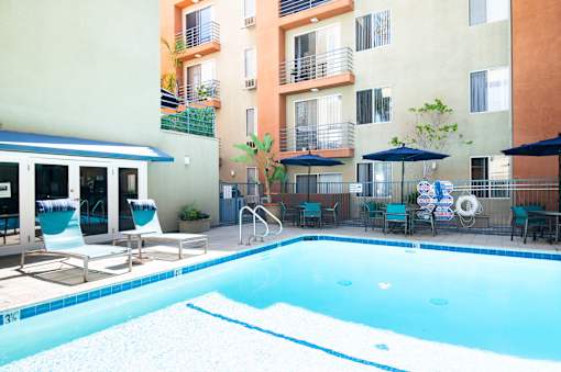 A pool with a blue line in the middle and a white line on the side.
