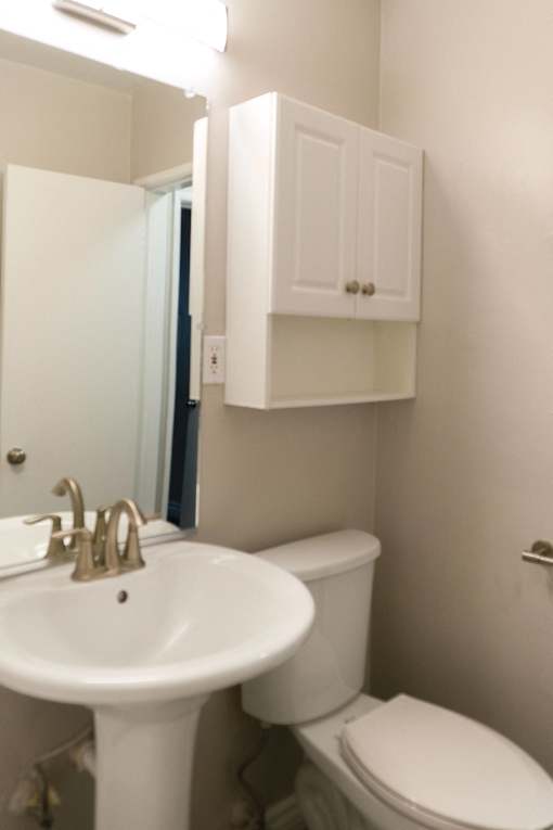 a small bathroom with a sink and a toilet