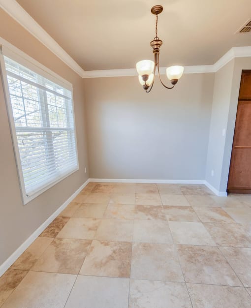 dining area with travertine in Briarwood floor plan