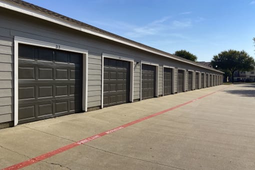 View of resident enclosed garages