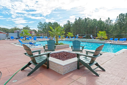 the swimming pool at the resort at governors crossing at Midtown Sam Houston Apartments, Huntsville, TX, 77340