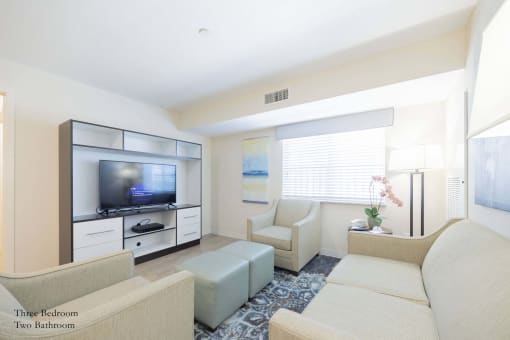 Living Room With TV at Parks Residential - Richardson, Richardson, Texas