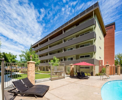 community pool and lounge chairs