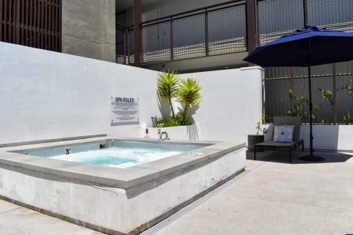 community hot tub and lounge chairs