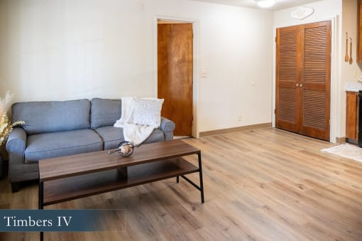 a living room with a couch and a coffee table