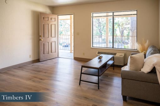 a living room with a couch and a coffee table