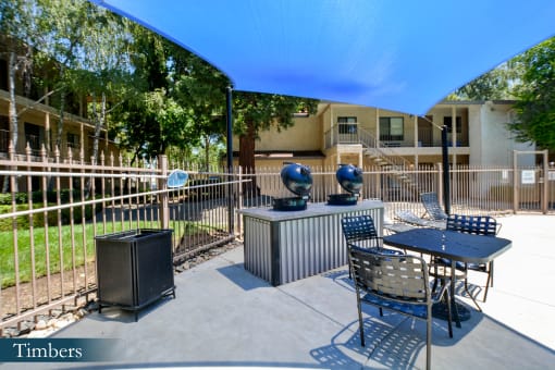 the preserve at ballantyne commons covered patio with tables and chairs