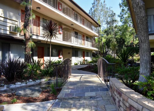 the walkway up to the apartment building