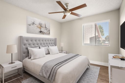 a bedroom with a large bed and a ceiling fan at Denim Scottsdale, Scottsdale, AZ