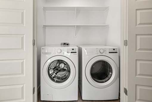 In unit washer and dryer in laundry closet at Lucero Apartments, Arizona