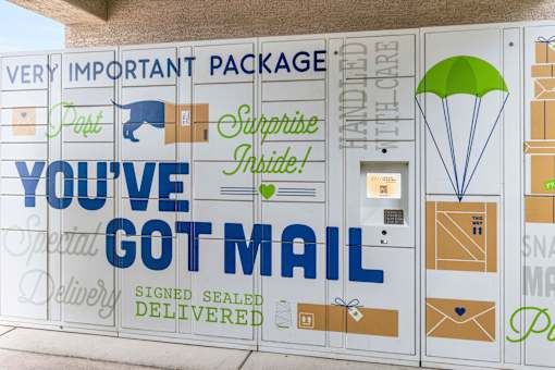 A sign that says "You've Got Mail" is displayed on a wall.