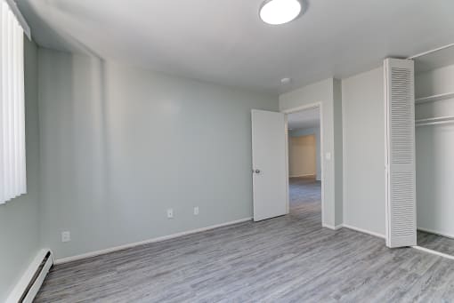 Bedroom With Closet at Johnson Legacy Apartments, Milwaukee, WI, 53223