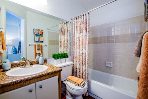 Full Bathroom with Ceramic Tile Tubs and Showers at Sky Harbor Apartments