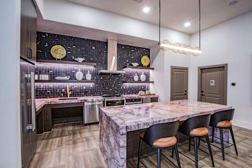 Resident Clubhouse house kitchen with stove and oven at Las Vegas apartments for rent